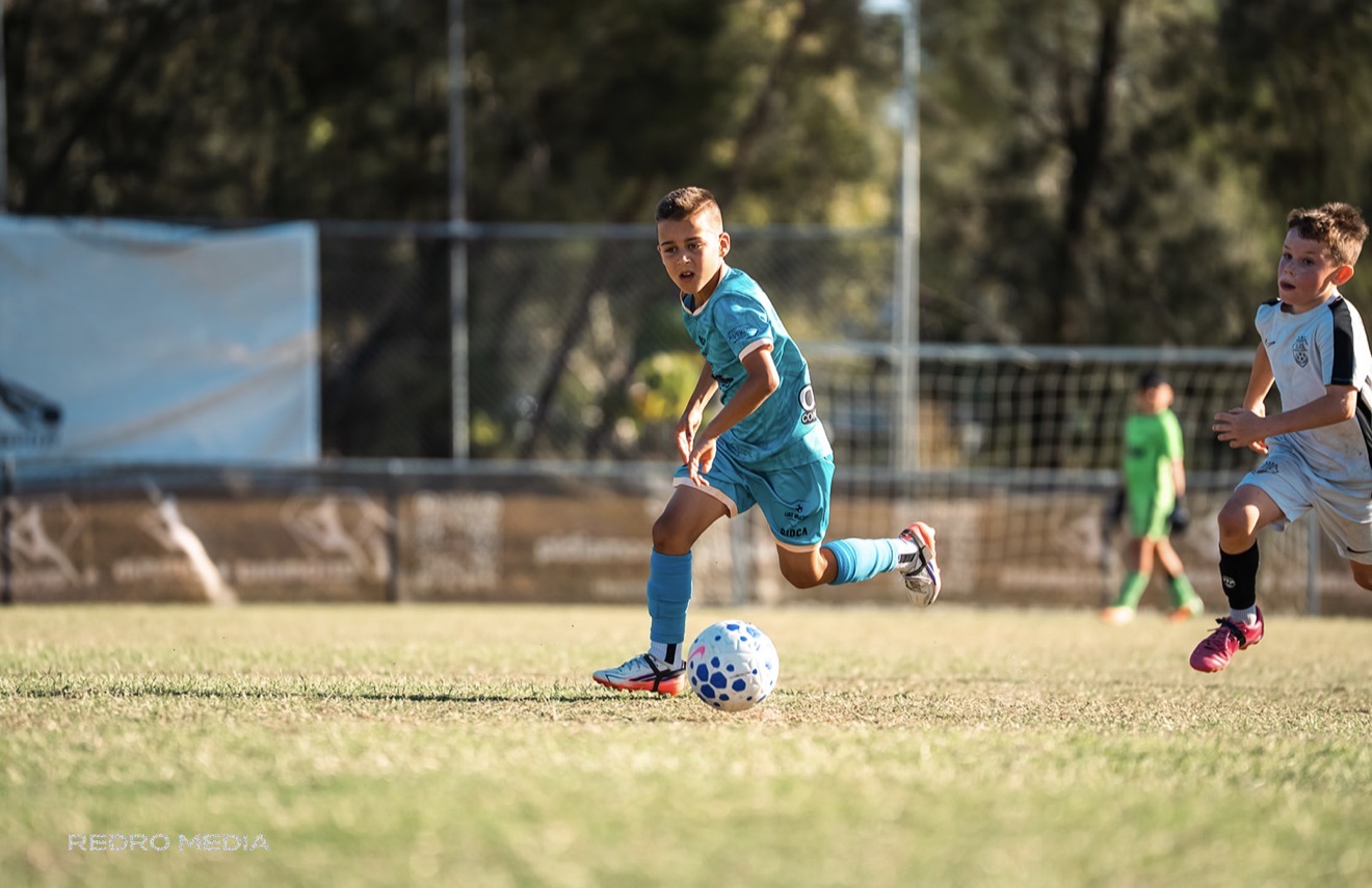 Frankie dribbling at pace