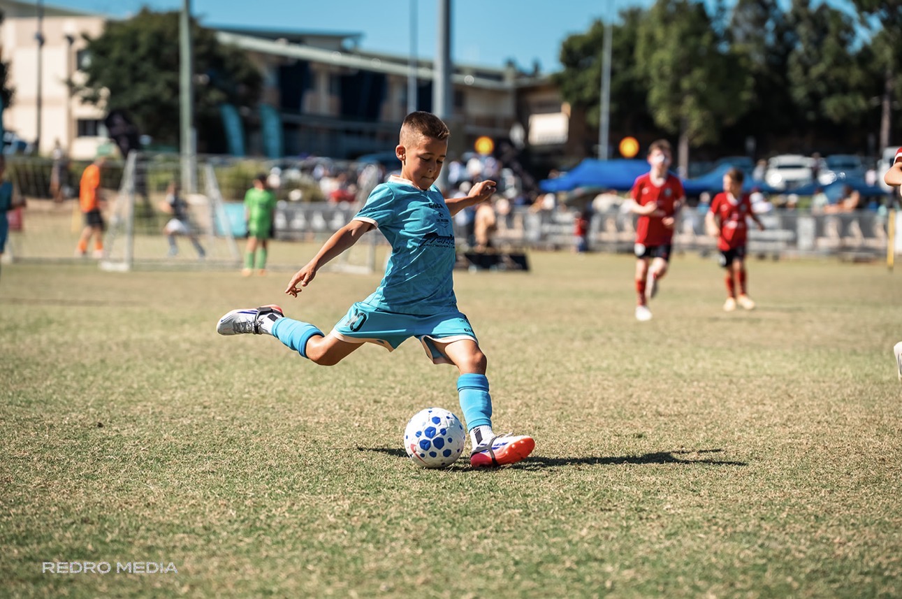 Frankie striking the ball