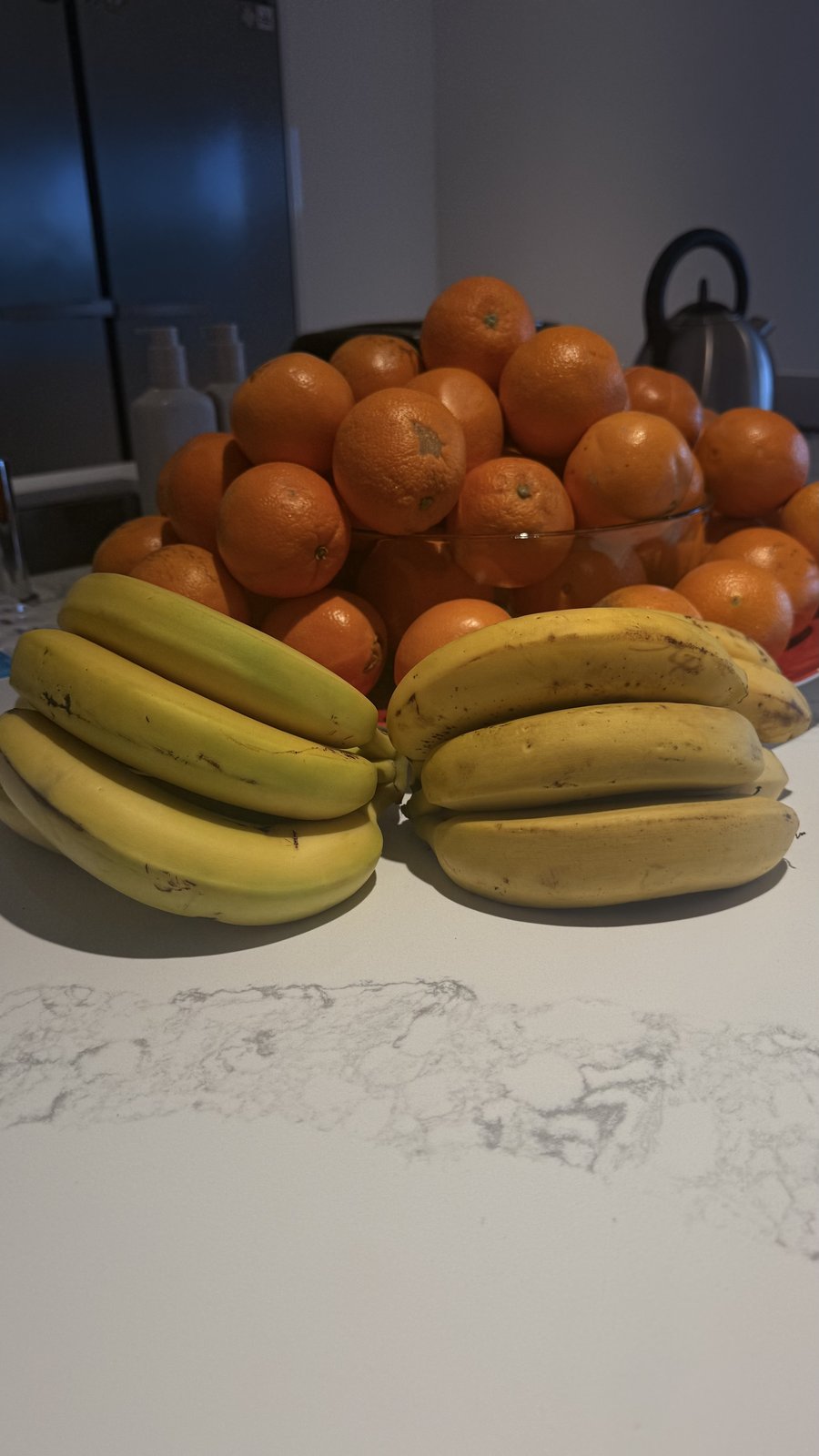 Bananas and oranges in the fruit bowl